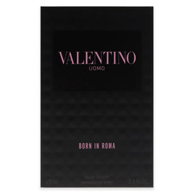 Valentino Uomo Born In Roma next to a ruler showing 3.4 oz scale for size clarity and value