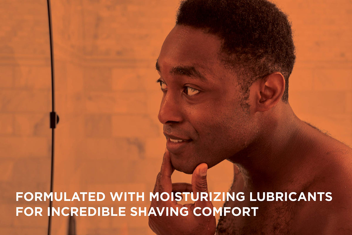 Shaving brush applying Van Der Hagen lather to face for smooth, irritation-reducing shave