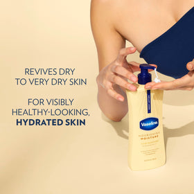 Vaseline bottle held in hand to show 20.3 oz scale and convenient home supply