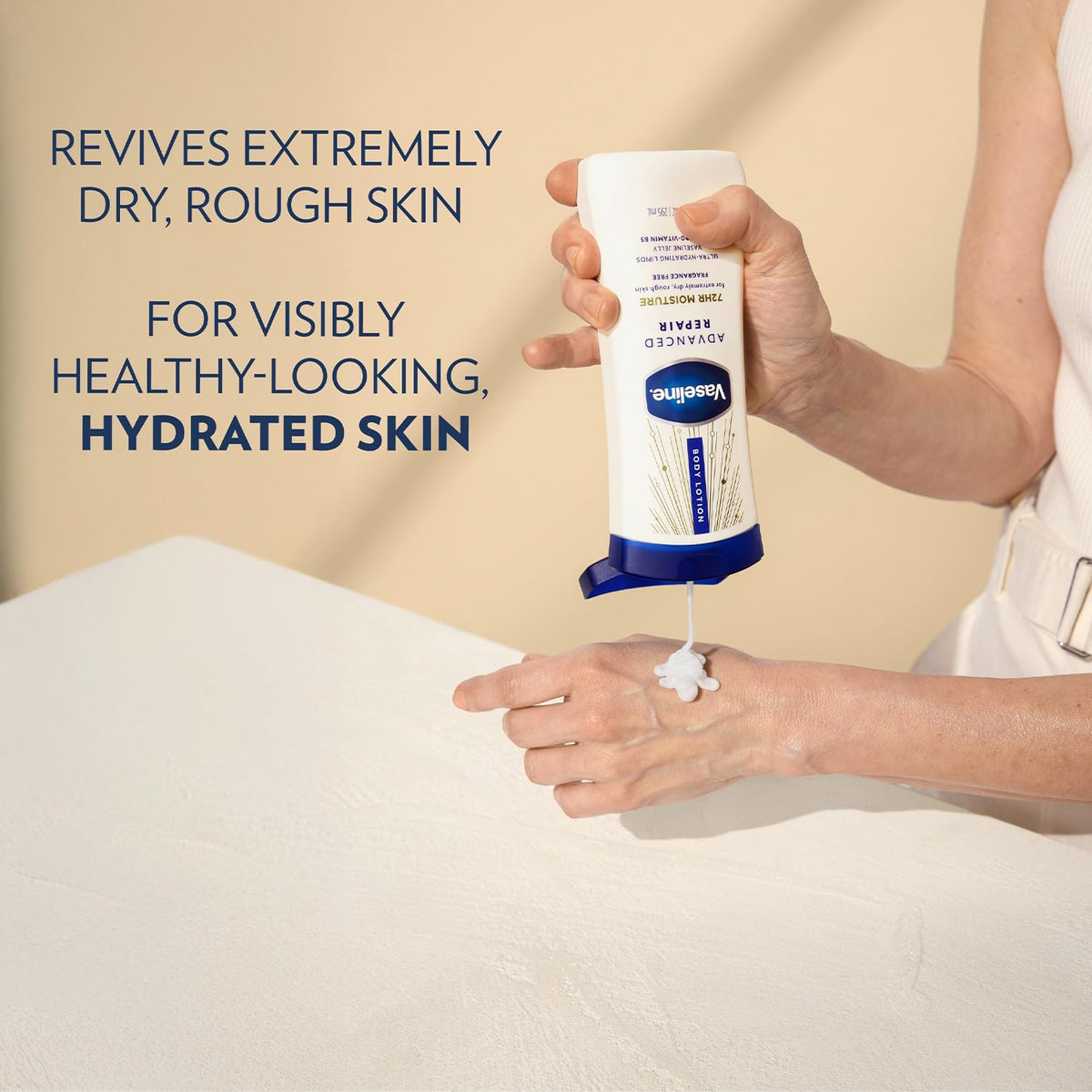 Applying Vaseline lotion to hands to relieve dry skin and restore softness