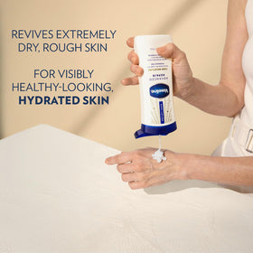 Applying Vaseline lotion to hands to relieve dry skin and restore softness