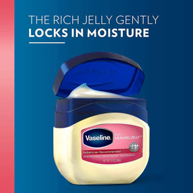 Vaseline tub held in hand to show 13 oz size and scale