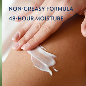 Vaseline bottle label detail showing product name and key benefits
