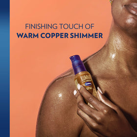 Vaseline bronzer oil dropper dispensing warm copper oil for radiant sheen