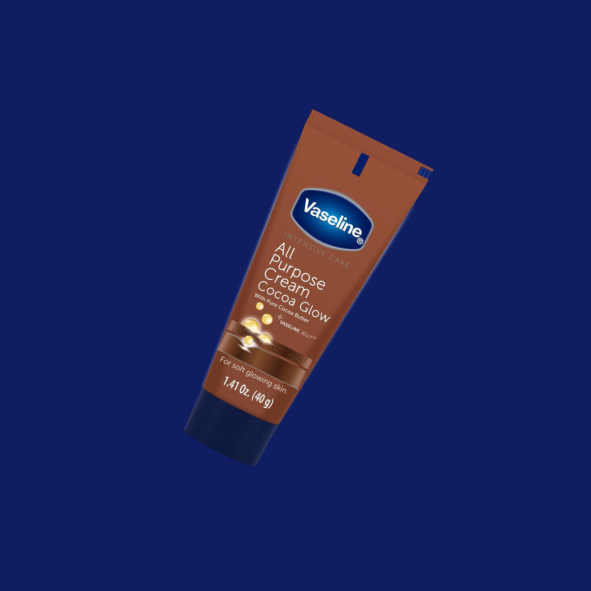 Applying Vaseline Cocoa Glow to hands demonstrating instant softening benefit