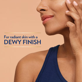 Vaseline applying stick to elbow for targeted hydration and glow
