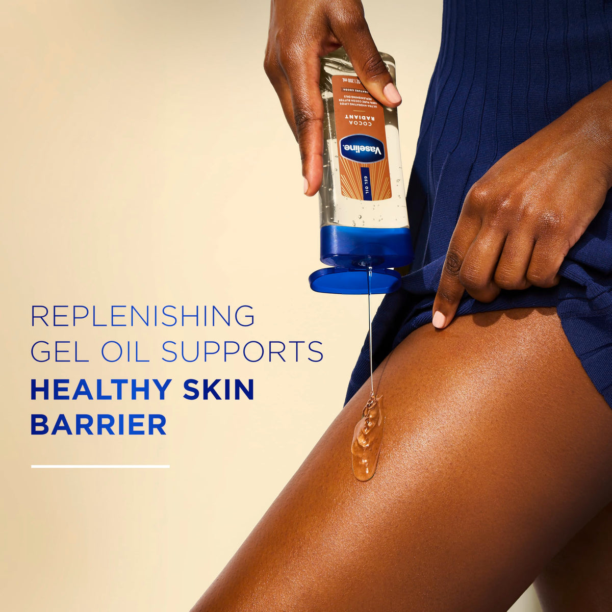 Vaseline label close-up highlighting cocoa butter and replenishing oils benefit