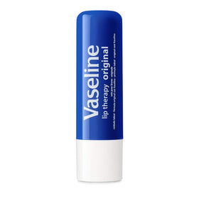 Vaseline lip balm in hand to show compact size and portability