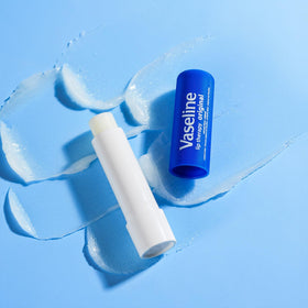 Vaseline with shea butter visual referencing natural emollient for softer lips