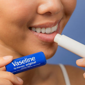 Vaseline tube inside travel bag suggesting convenience for trips and daily carry