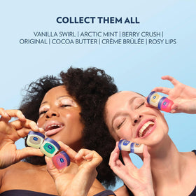 Vaseline mini jar next to coin showing compact travel-friendly size