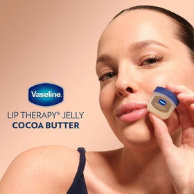 Vaseline jar on nightstand indicating overnight lip care convenience