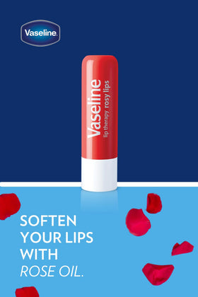 Vaseline stick held in hand to show compact size and travel convenience