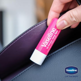 Vaseline rosy balm in pocket illustrating on-the-go hydration access