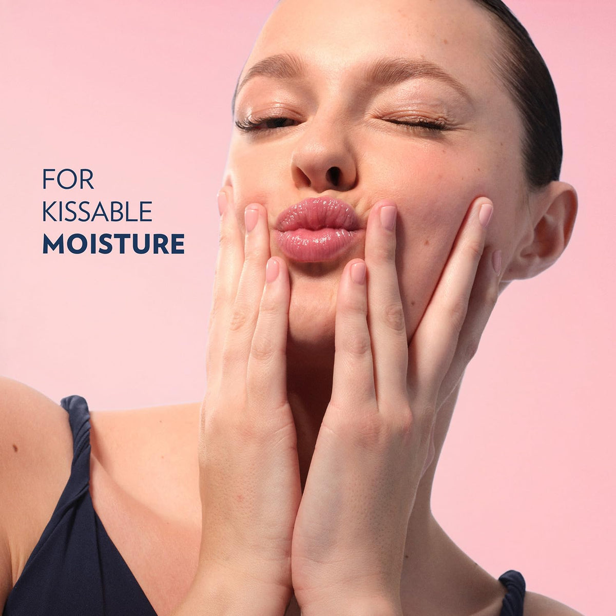 Vaseline rosy lips applied on lips detail showing subtle pink tint and softening effect