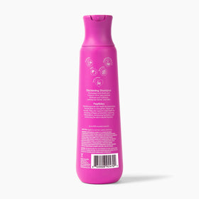 V&Co 12 oz bottle next to hand to show size