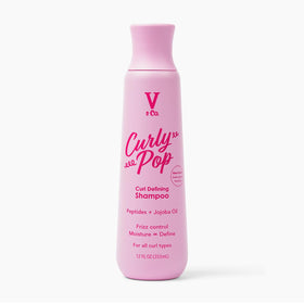V&CO front bottle shot showing label and curl-focused branding for easy identification
