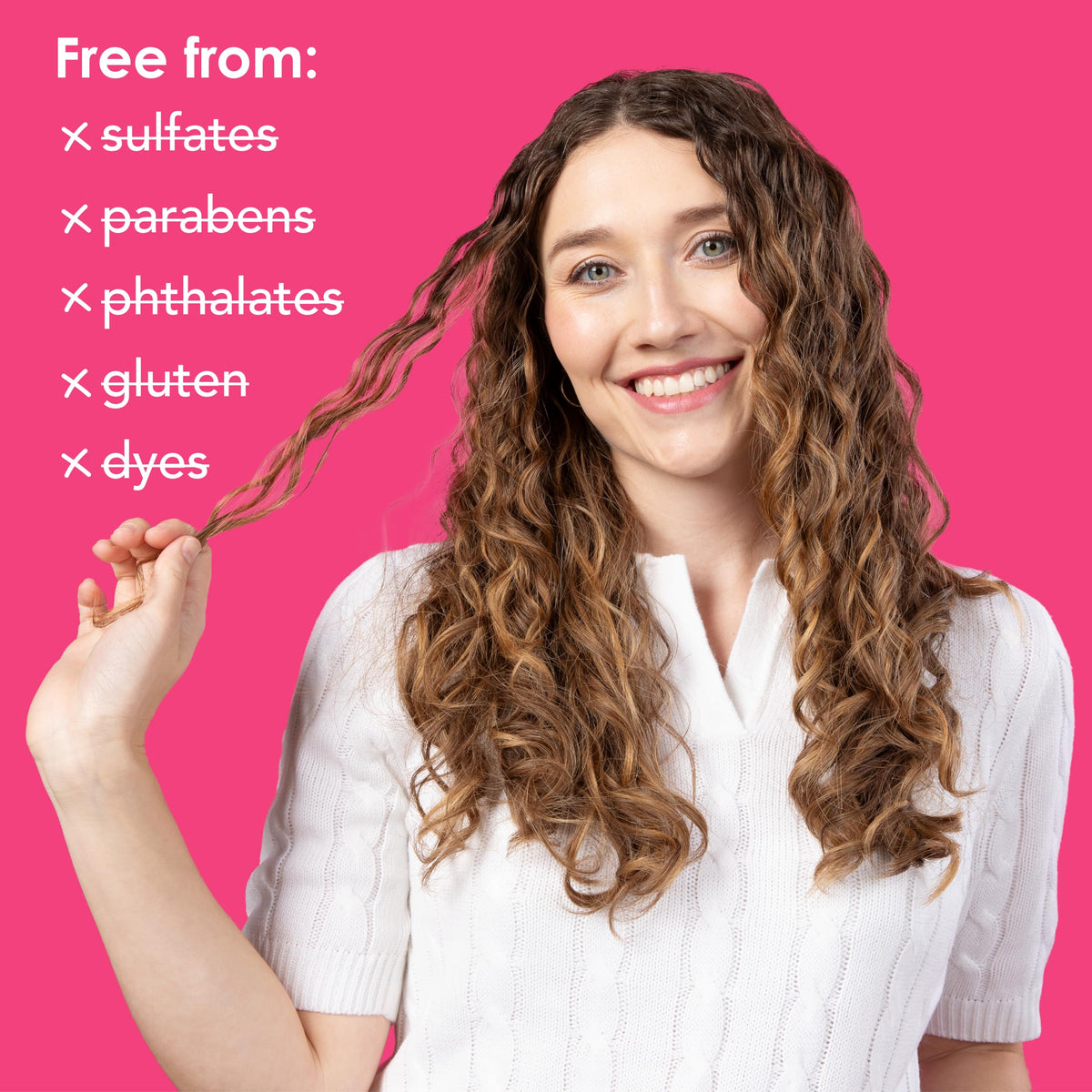 V&Co conditioner in shower being applied to wet curly hair for frizz control