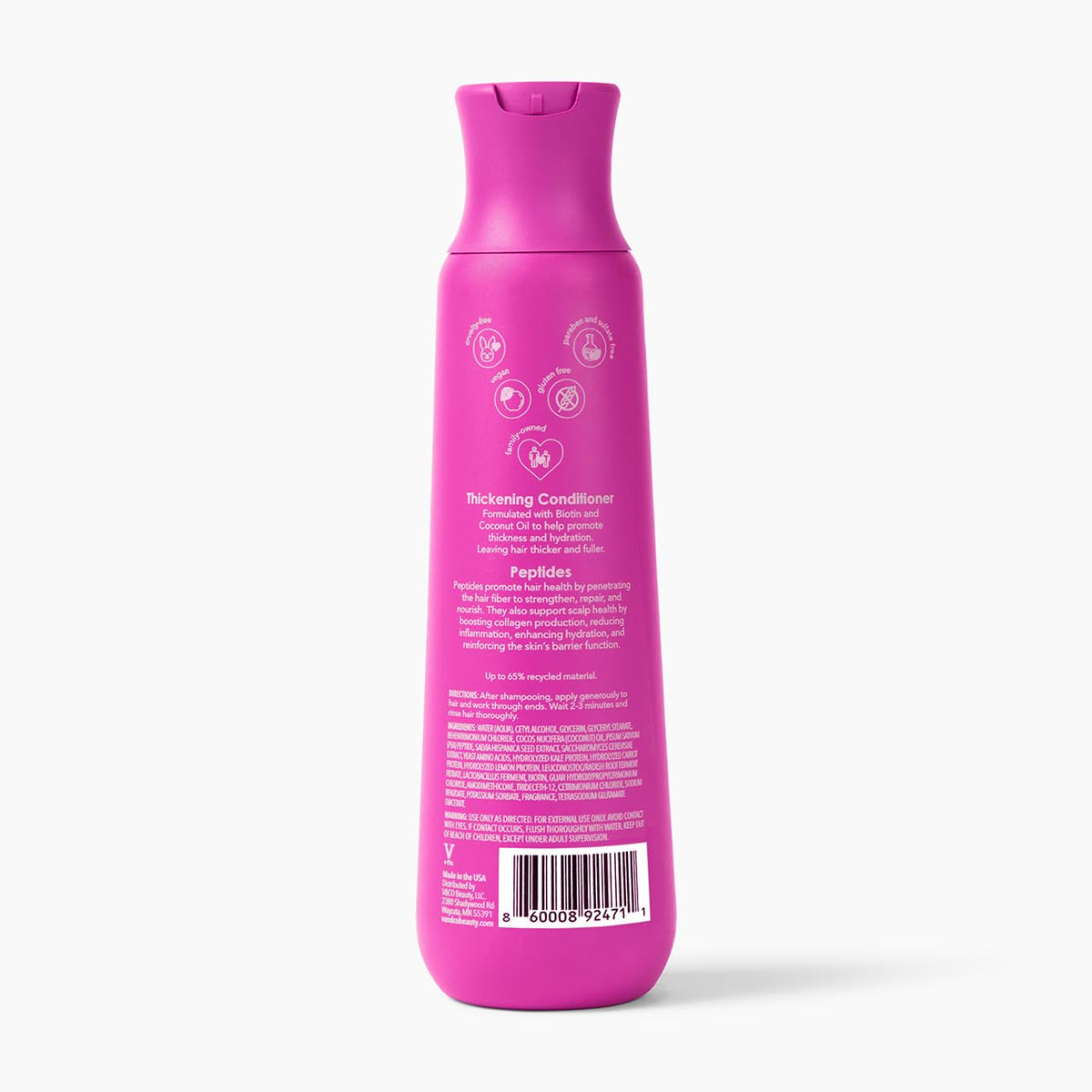 V&CO bottle on bathroom shelf in styled setting implying daily volume-enhancing routine