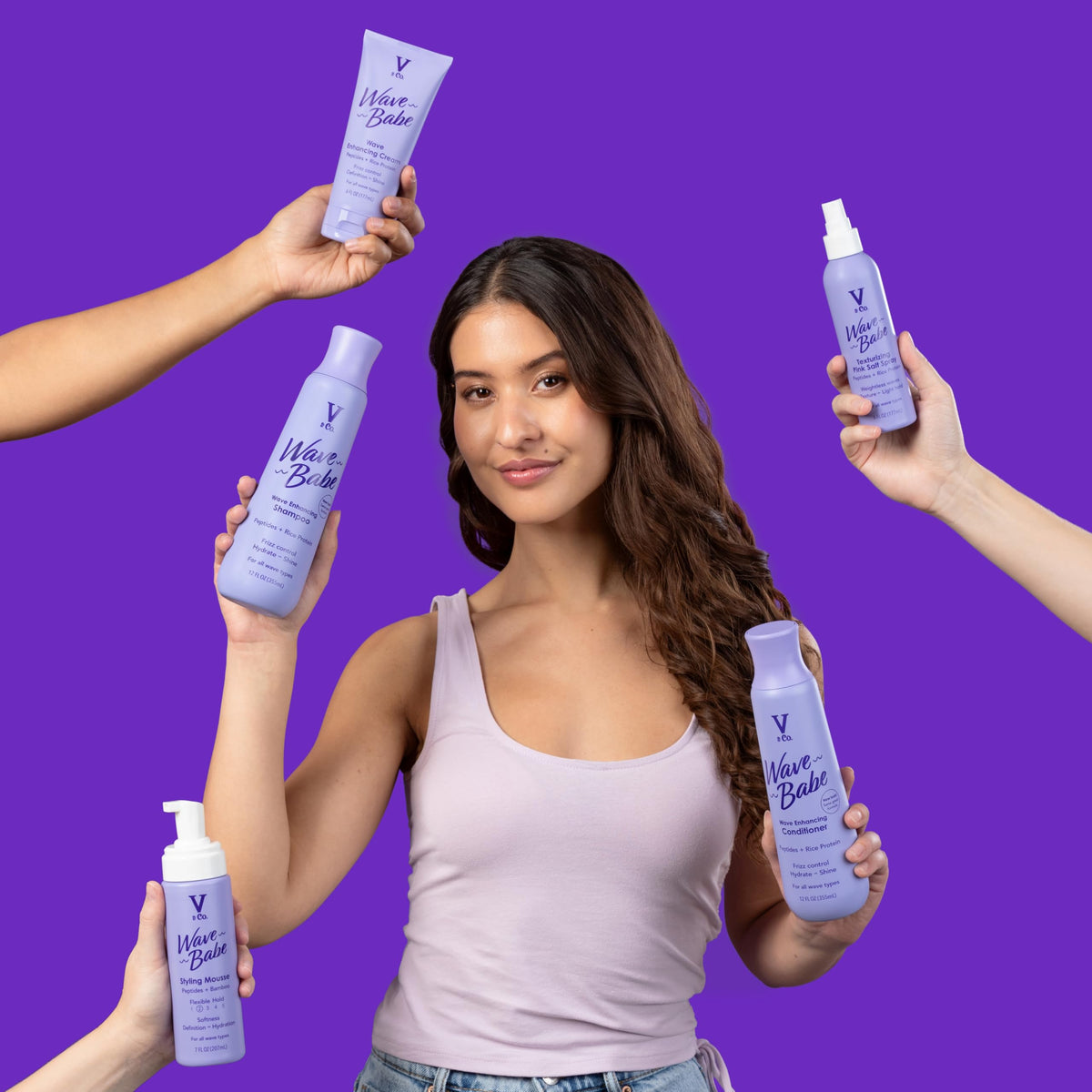 V&CO Wave Babe 6 oz held in hand for scale, communicates travel-friendly size