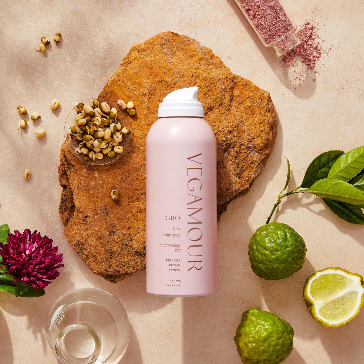 VEGAMOUR GRO Dry Shampoo on bathroom shelf styled in lifestyle setting for daily routine