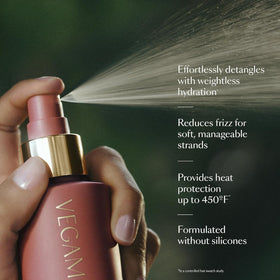 VEGAMOUR bottle in hand illustrating travel size and portability