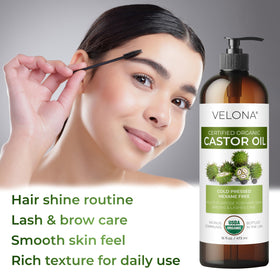 velona castor oil droplet on fingertip highlighting rich texture and easy blending