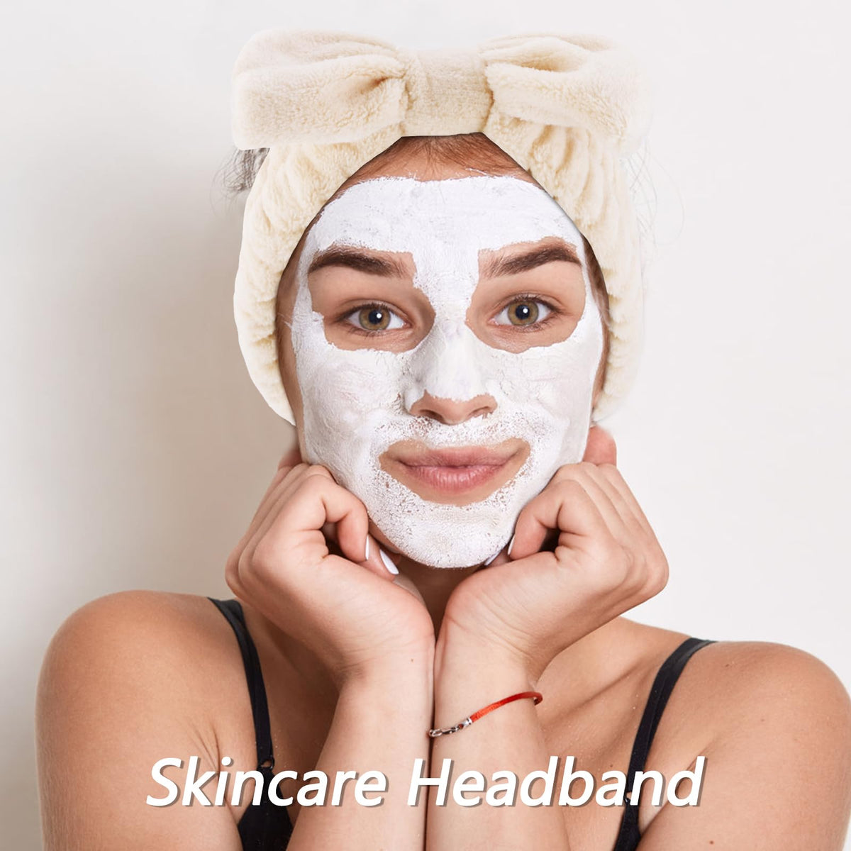VELSCRUN model wearing headband while washing face to keep hair away and improve skincare routine