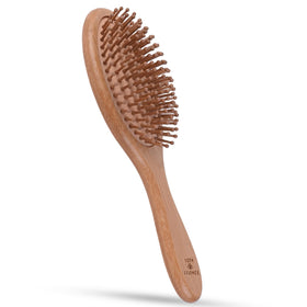 Vera Essence front view of bamboo brush showing paddle benefits