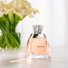 Vera Wang boxed fragrance in a bedroom setting illustrating gift-ready, stylish packaging