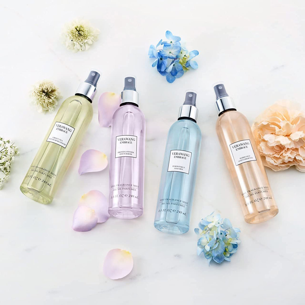 Vera Wang bottle on vanity with flowers illustrating daily routine and uplifting scent