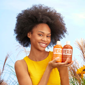 VERB lifestyle model with defined curls showing improved curl definition