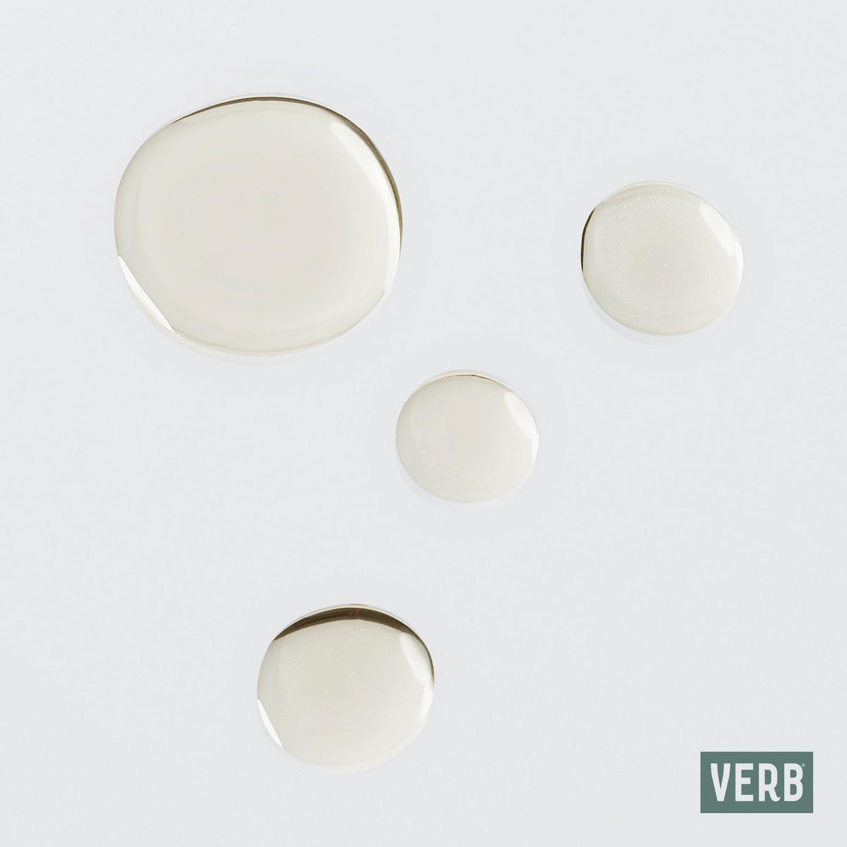 VERB Curl Oil texture on hand illustrating slip and non-greasy finish benefit