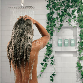 VERB in-shower application demonstrating massage into scalp for relief