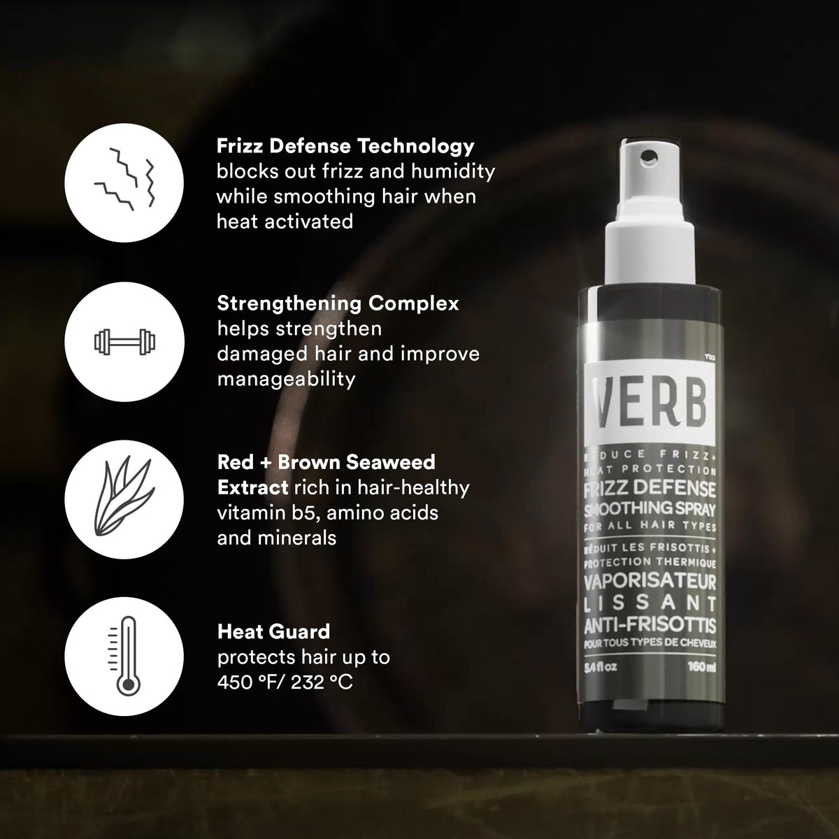 VERB stylist using spray during blowout to protect hair and smooth flyaways
