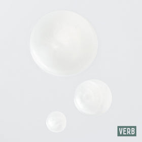 Hand holding VERB Ghost Shampoo showing easy dispensing and manageable amount