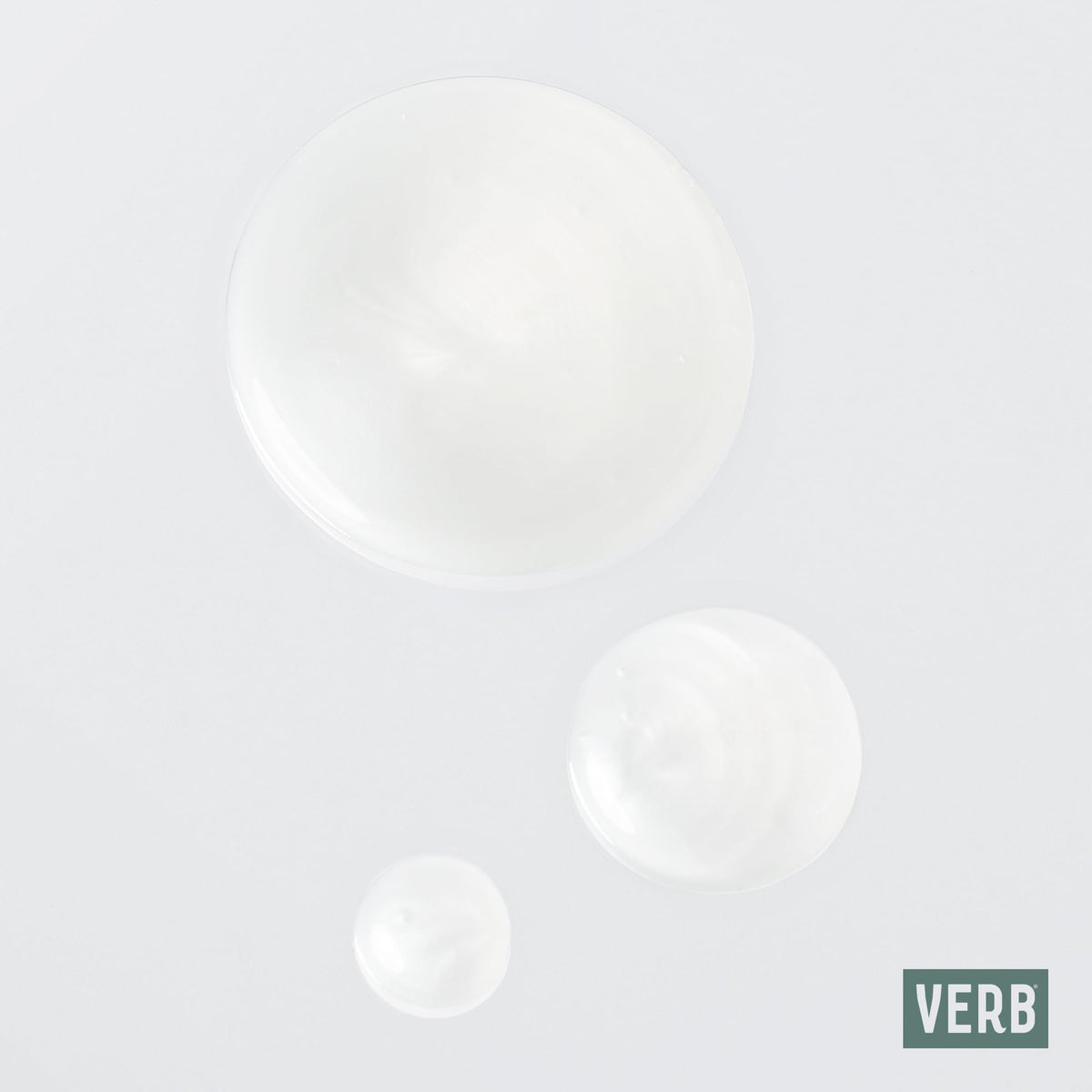 VERB Ghost Shampoo foam on hair showing texture, conveys gentle cleansing and softening benefit