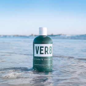 VERB shampoo paired with conditioner on counter showing hydrated hair results