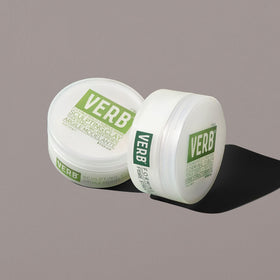 Verb sculpting clay being worked into dry hair demonstrating added texture and flexible hold