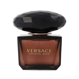 Versace Crystal Noir close-up of cap and label showing designer detail benefit: premium finish