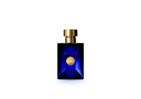 Versace Dylan Blue lifestyle model wearing fragrance outdoors conveying fresh Mediterranean appeal