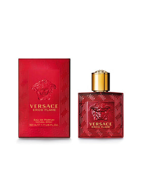 Versace Eros Flame on wrist in evening setting, showing confident warm scent appeal