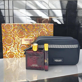 Versace Eros Flame ingredients still life with woods and amber reflecting warm base