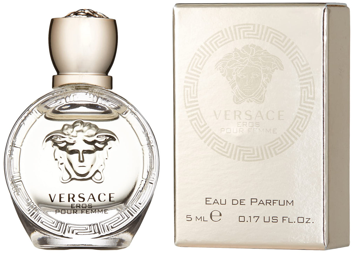 Versace bottle close-up of glass and cap detail, highlighting craftsmanship