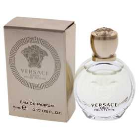 Versace mini bottle held in hand to show true 0.17 oz scale and portability