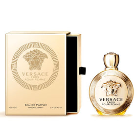 Hand spraying Versace Eros Pour Femme illustrating easy application and light daytime projection
