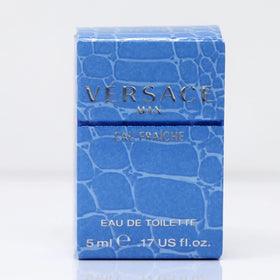 Versace mini in travel kit lifestyle scene for on-the-go quick refresh