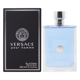 Hand holding Versace Pour Homme bottle demonstrating easy application and everyday convenience