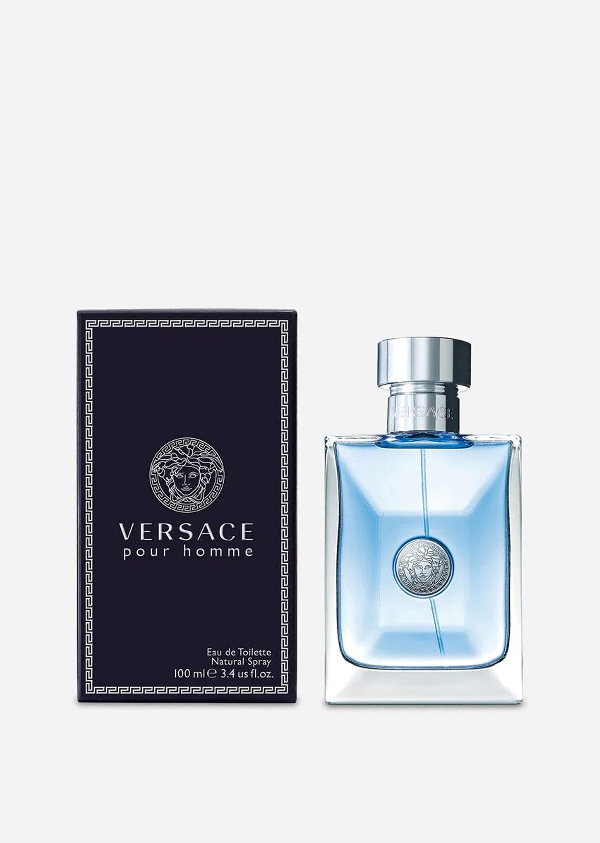 Versace bottle on wood close-up emphasizing warm woody character