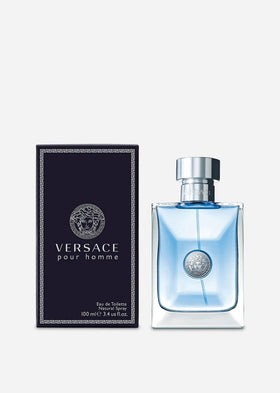 Versace bottle on wood close-up emphasizing warm woody character